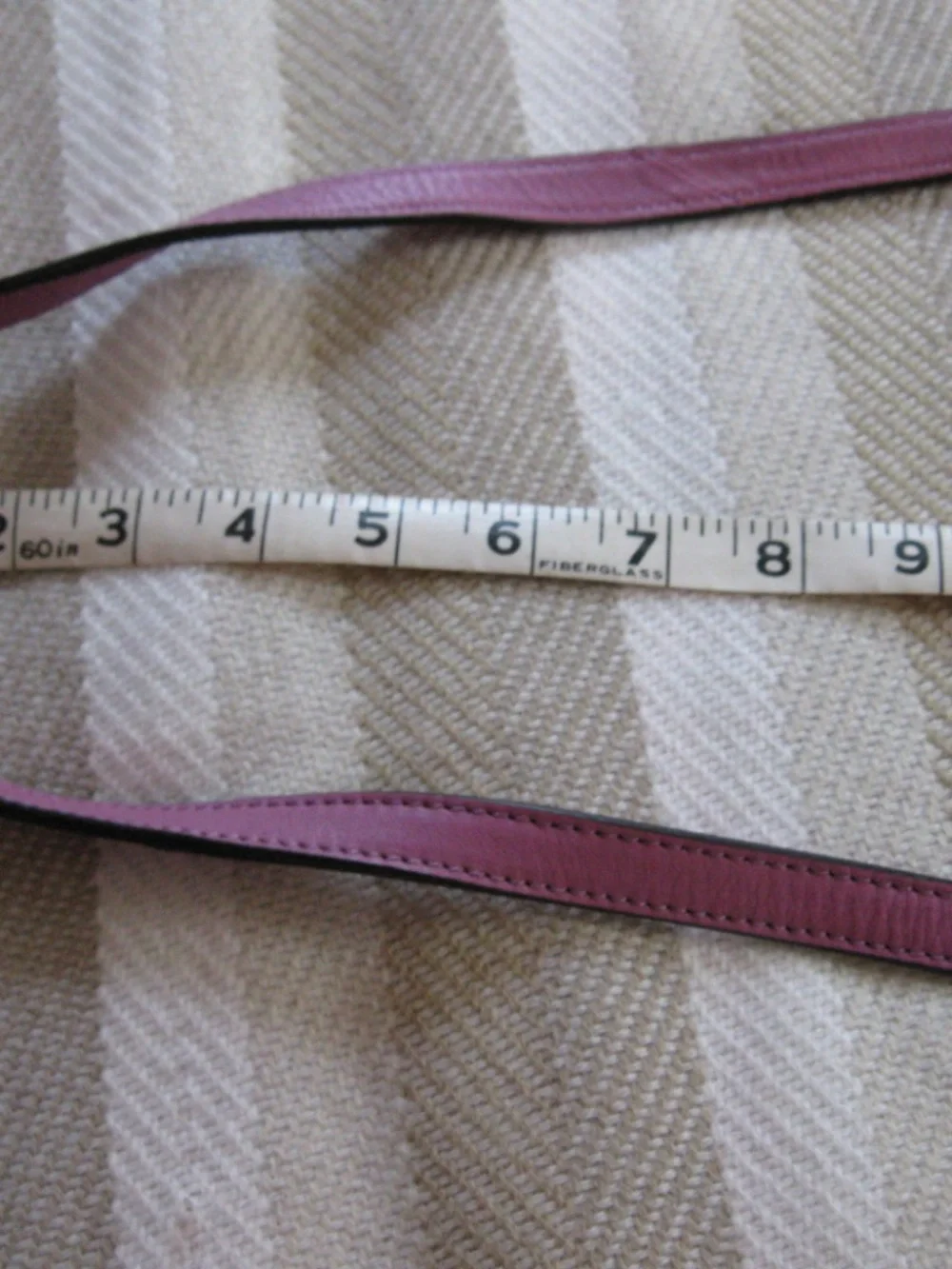 B. Makowsky purple leather crossbody handbag